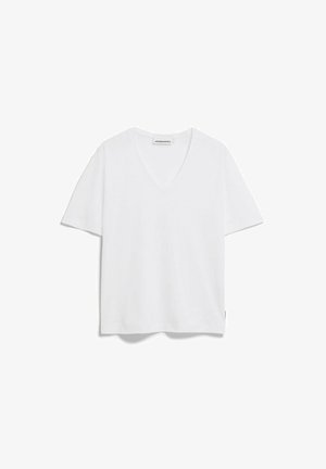 T-shirt blanc à col en V et manches courtes, coupe décontractée, avec une petite étiquette de la marque à l'intérieur du col et à l'ourlet latéral.