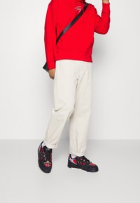 Tommy Jeans Jersey con capucha - red