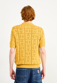 HUF MONOGRAM ZIP UNISEX - Vesta na kopčanje - dijon