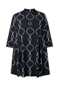 Tunic nero a linea ad A con maniche a 3/4, linee verticali bianche ondulate, collo alla coreana e chiusura frontale con mezza zip.