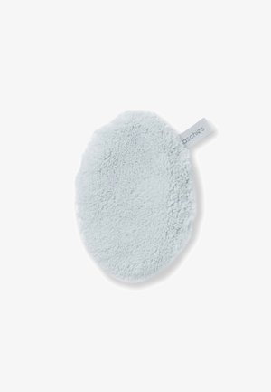 Round light blue microfiber facial cleansing pad with fabric loop tag on white background.