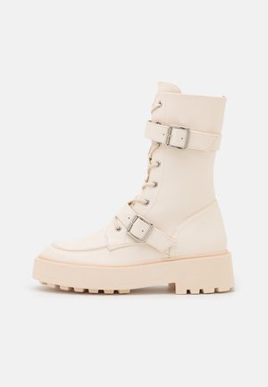 Plateaustiefelette - off-white