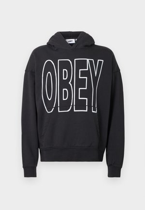Zwarte hoodie gemaakt van katoen, met een groot wit "OBEY"-logo aan de voorkant, een buidelzak en geribbelde manchetten en zoom.