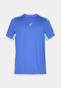 Blue short-sleeve athletic shirt with light green shoulder and underarm panels, featuring a small orange logo at the center chest.