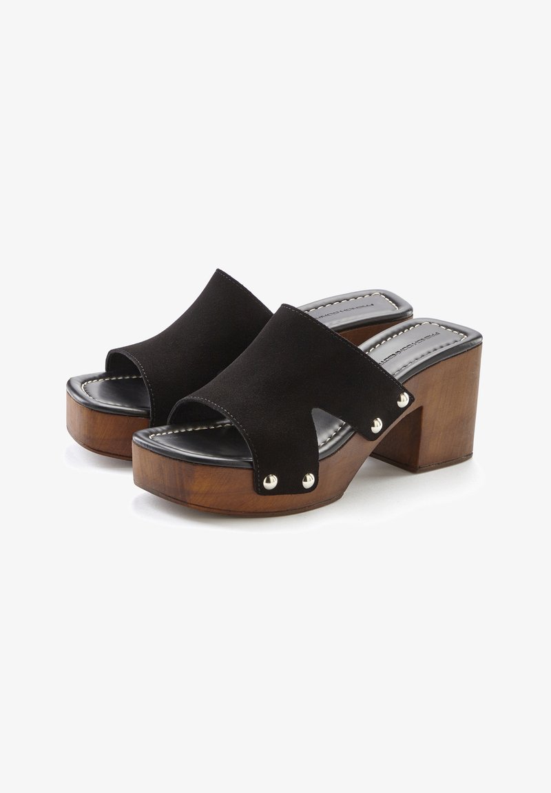 Black suede platform sandals with an open toe, wooden block heel, and silver stud accents. Features a wide strap across the top.
