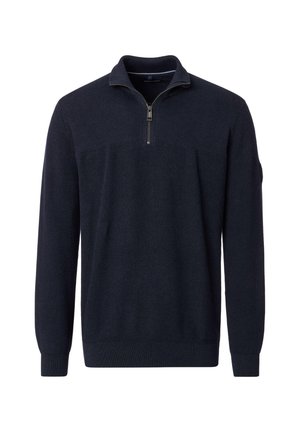 Marineblauer Pullover mit einem Viertel-Reißverschluss-Kragen, gerippter Textur, langen Ärmeln und enganliegenden Bündchen. Verfügt über ein dezentes Muster im Brustbereich.