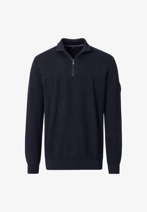 Marineblauer Pullover mit einem Viertel-Reißverschluss-Kragen, gerippter Textur, langen Ärmeln und enganliegenden Bündchen. Verfügt über ein dezentes Muster im Brustbereich.