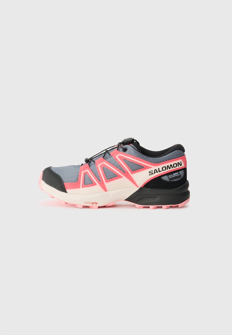 Salomon running shoe features a grey mesh upper with pink accents, black details, a contagrip sole, and a secure lacing system.