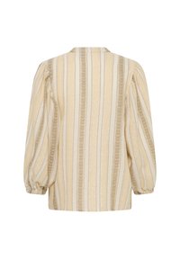 Blouse rayée beige et crème avec des manches longues bouffantes et des poignets élastiques, présentant des détails de motif vertical et un ourlet droit.