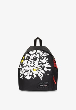 Sac à dos noir avec un grand motif graphique abstrait blanc, jaune et noir, poche avant zippée et tirettes de fermeture éclair rouges. Logos Disney et Eastpak visibles.