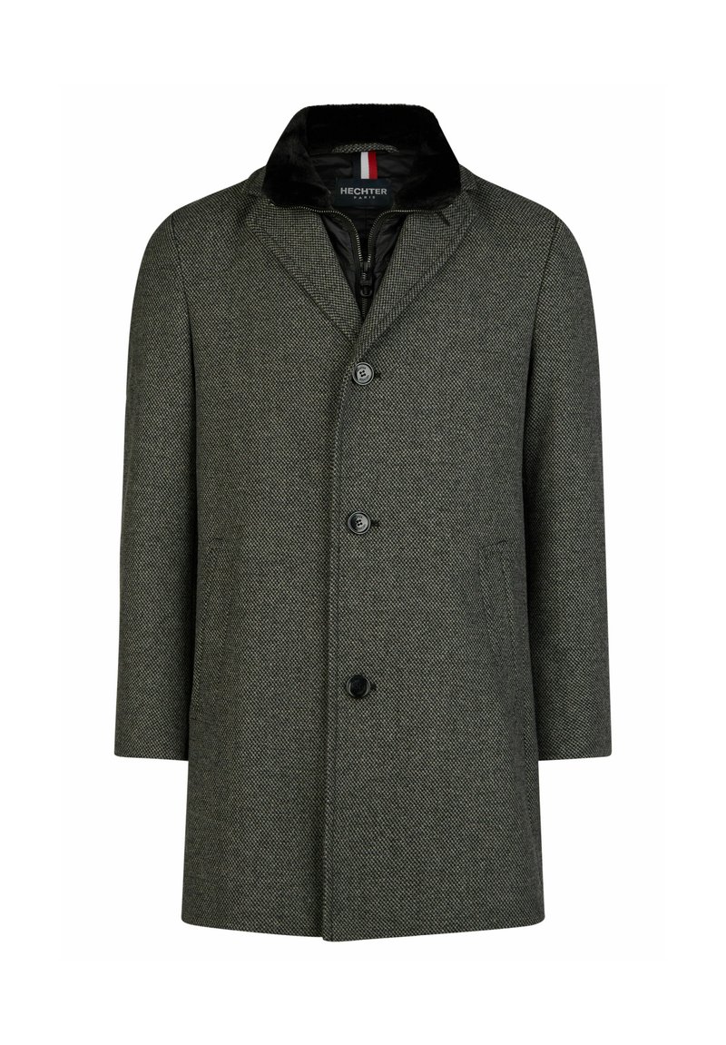 Grijze houndstooth wolmix jas met een geknopt kraag, vijf knopen aan de voorkant en twee zijzakken. Voering met rits sluiting.