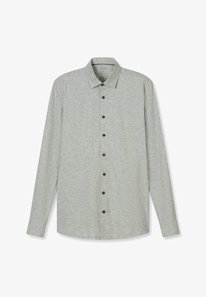 Langärmliges Hemd aus hellgrauem Stoff mit einer Knopfleiste vorne in schwarzer Farbe, einem spitzen Kragen und seitlichen Schlitzen.