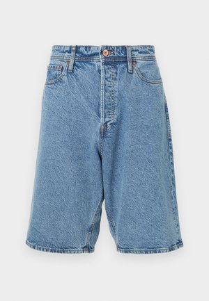 Gaišzili džinsu šorti ar izbalinātu tekstūru. Iespējas ar priekšējo pogu aizdari, jostas cilpām un sānu kabatām. Dzelzīgi redzami dūrieni.