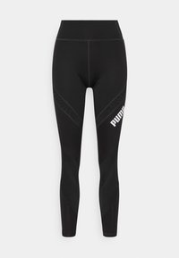Leggings sportivi neri con vita alta, realizzati in materiale elasticizzato. Presentano pannelli laterali texturizzati e un logo bianco sulla parte inferiore della gamba.