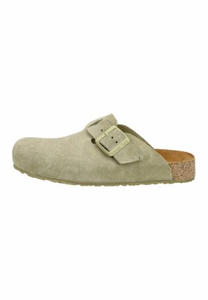 Beige Wildleder-Pantolette mit verstellbarem Schnallenriemen und Korksohle, entworfen für lässigen Komfort und einfaches An- und Ausziehen.