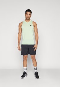 adidas Performance TRAIN ESSENTIALS FEELREADY - Top - semi green spark/black