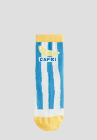 Blå och vita randiga strumpor med en gul mudd och tå. Har en citron grafik och ordet "CAPRI" i blått. Stickad textur.