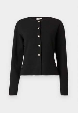 Svart langermet cardigan med rund hals og seks sølvknapper foran, noe innsvingt i livet.