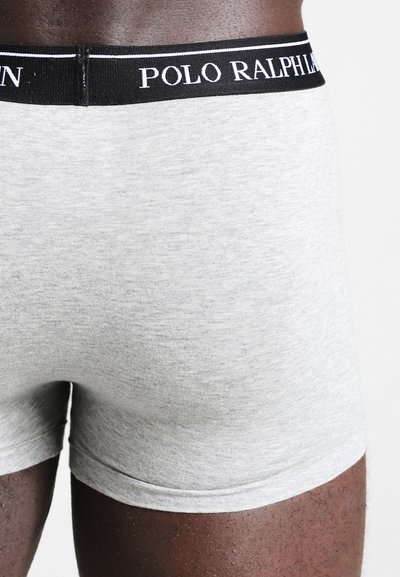 Grijze katoenen boxershorts met een zwarte tailleband waarop het "POLO RALPH LAUREN" logo in het wit is afgedrukt. Soepele textuur en een aansluitend ontwerp.