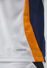 adidas Performance REAL MADRID 24/25  JERSEY - Sporto klubų atributika - white/team navy blue/crew orange