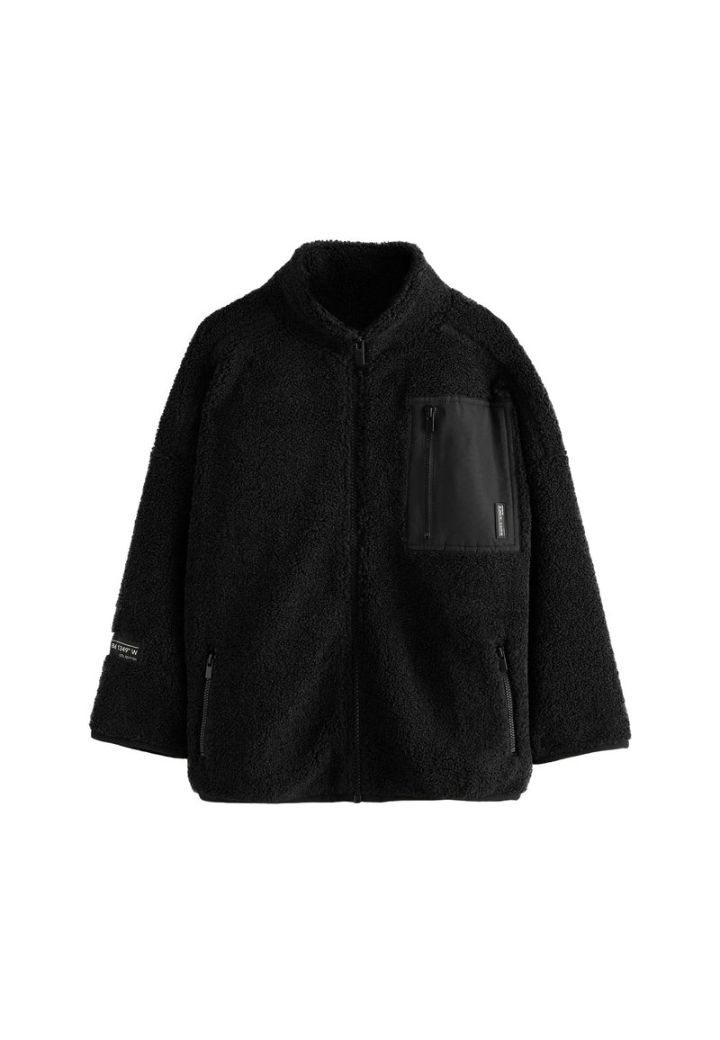 Black fleece jacket with full front zipper, two zippered side pockets, and a zippered chest pocket with smooth fabric panel.