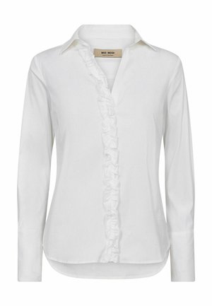 White long-sleeve shirt in cotton with a ruffled front placket, traditional collar, and rounded hemline, featuring buttoned cuffs.