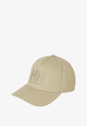 Béžová baseballová čepice Helly Hansen s klenutým kšiltem a prošitými větracími otvory na jednobarevném bílém pozadí.