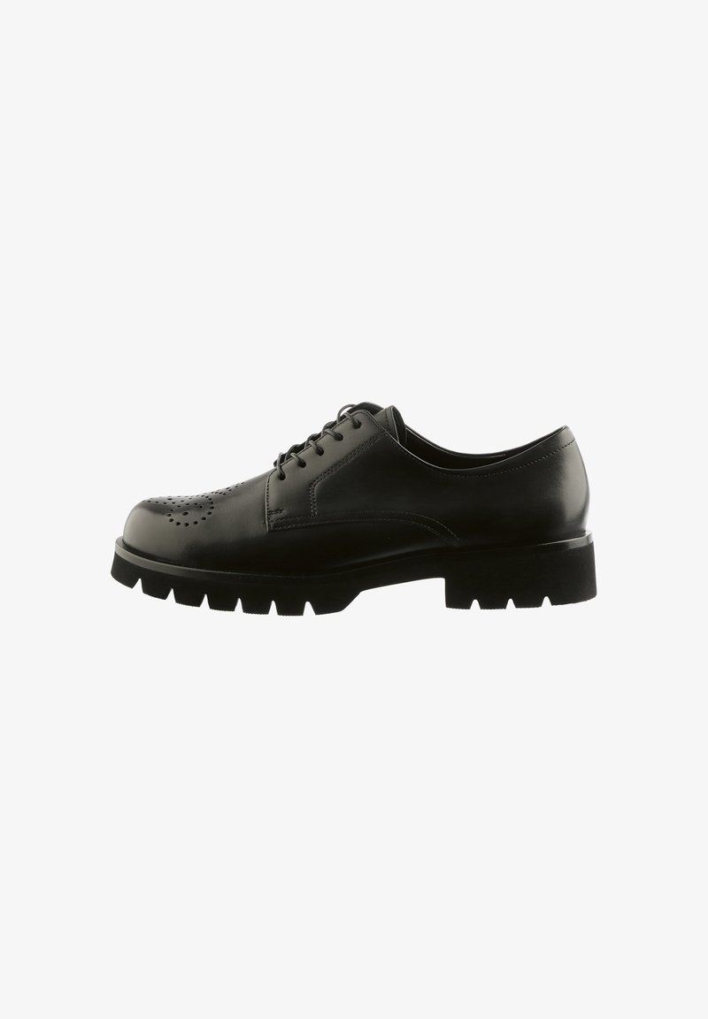 Sorte læder snørebrogue sko med perforerede detaljer og en tyk, robust sål, vist fra siden på hvid baggrund.