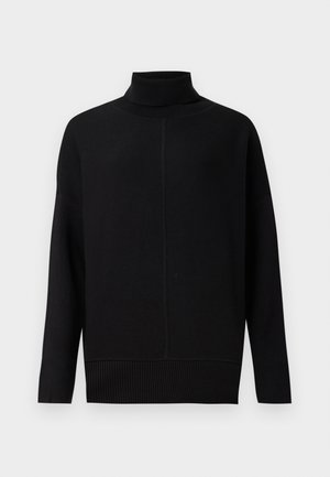 Sort turtleneck-sweater lavet af blødt strikkemateriale. Har en afslappet pasform, drop-shoulders, og ribbede kanter og manchetter for en struktureret detalje.