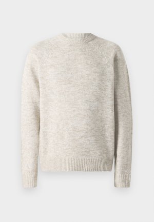 Lys beige genser laget av teksturert strikket stoff. Har rund hals og ribbekanter på ermer og nederst. Enkel, pullover-design.