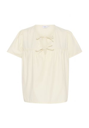 Cremfarbener Oberteil mit kurzen Ärmeln, gerafftem Taillenbund und einer Bindeschleife am Halsauschnitt. Weicher Baumwollstoff mit lockerer Passform.