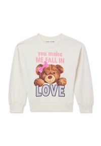 Felpa bianca con un grafiche di un orsetto con un fiocco rosa, accompagnata dal testo "you make ME FALL IN LOVE" in colori vivaci.