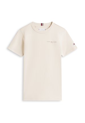 Tommy Hilfiger kratka majica s kratkimi rokavi v kremni barvi z napisom logotipa na prsih in majhno zastavico na levi rokavi.