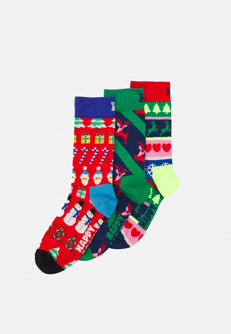 Trois paires de chaussettes à motifs : rouges avec des bonhommes de neiges et des cadeaux, vert foncé avec des rennes, et bleu marine avec des cœurs et des arbres. Mélange de coton, longueur mi-mollet.