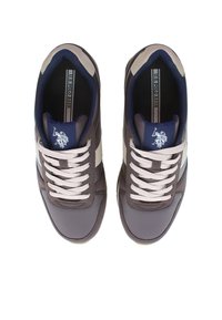 Brązowe buty sportowe z białymi i granatowymi akcentami. Wśród cech znajdują się fakturowana cholewka, okrągłe sznurówki oraz logo na języku.