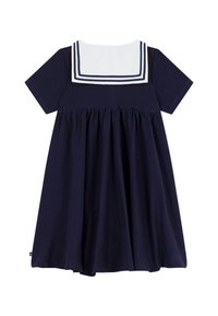 Φόρεμα από βαμβάκι σε ναυτικό μπλε χρώμα με κοντά μανίκια, λευκό γιακά ναυτικού τύπου με μπλε ρίγες και φούστα με πιέτες για επιπλέον όγκο.