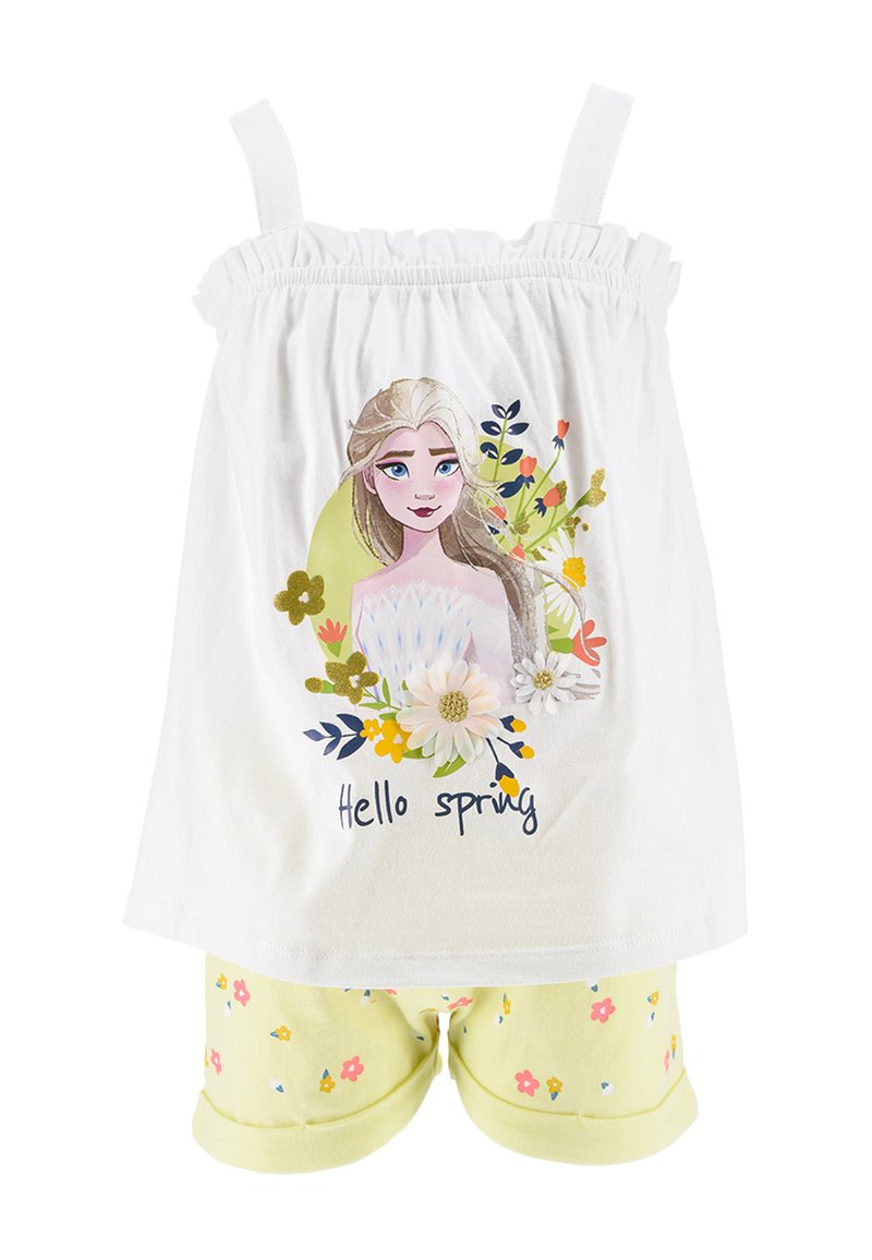 Weißes Tanktop mit elastischen Trägern, das ein Blumendesign und den Text "Hallo Frühling" zeigt. Kombiniert mit hellgelben Shorts mit Blumenmustern.