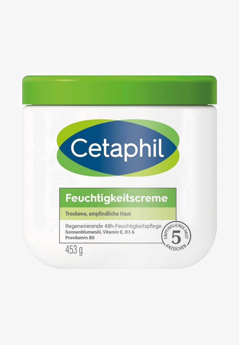 Cetaphil Feuchtigkeitscreme in einem weißen Plastikbehälter mit grünem Deckel; gekennzeichnet für trockene und empfindliche Haut; Gewicht 453 g; hebt die wichtigsten Inhaltsstoffe hervor.