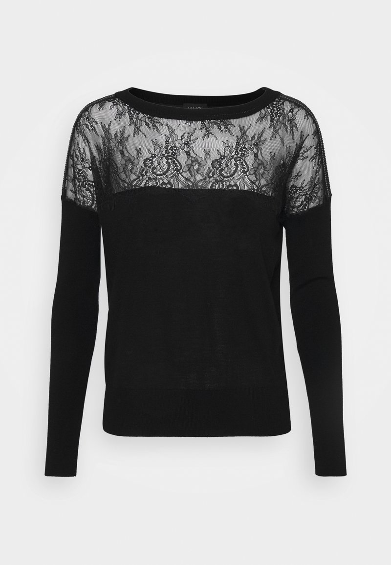 Schwarzer Pullover mit transparentem Spitzeneinsatz und aufwendigen Mustern, langen Ärmeln und rundem Ausschnitt. Weiches Strickmaterial am Körper.