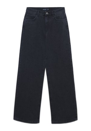 Jeans neri a gamba larga con una sottile texture a pois, bottone anteriore, zip e design a cinque tasche, stesi su uno sfondo bianco.