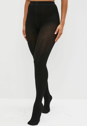 Schwarze gerippte Strumpfhosen mit hoher Taille, die ein strukturiertes Fischgrätmuster und einen einfarbigen Fußbereich aufweisen. Glatte Oberfläche und dehnbare Stoffqualität.