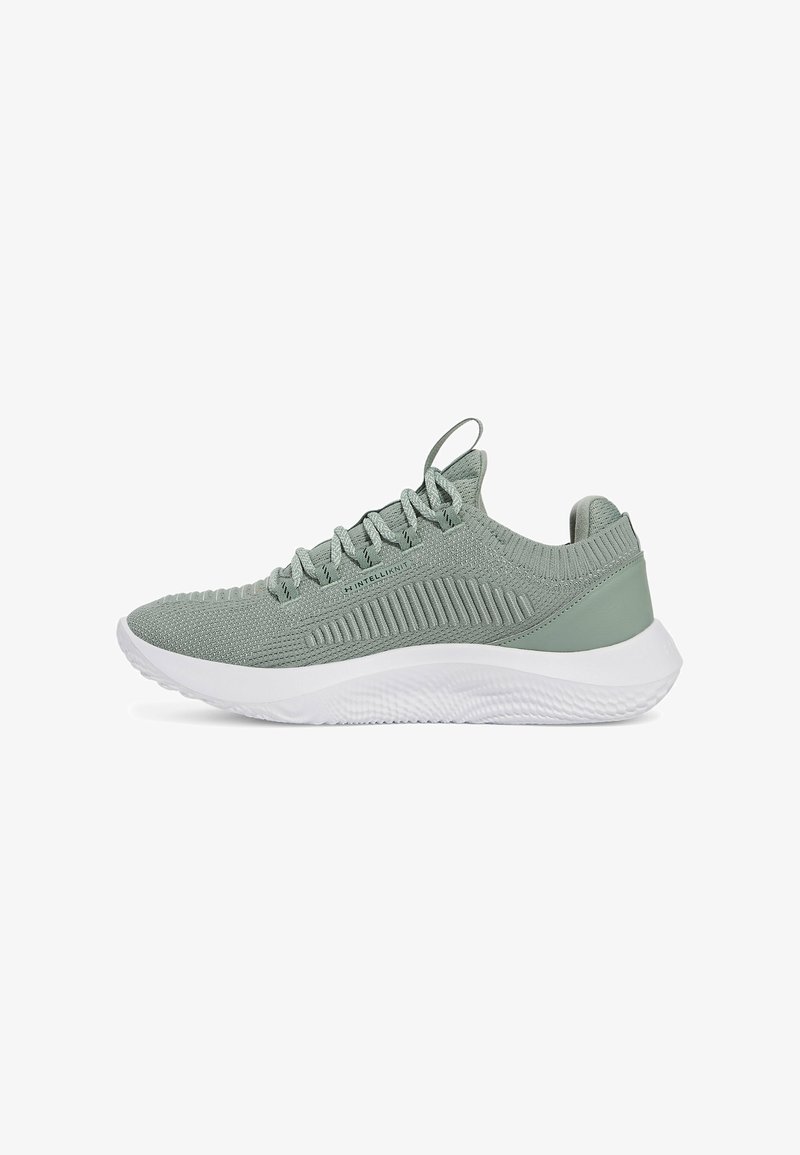 Light green athletic sneaker with a textured knit upper, flat laces, and a white rubber sole. Features a reinforced heel and subtle striping.