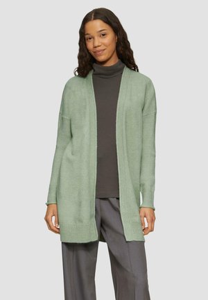 Lichtgroene cardigan met open voorkant, geribbelde manchetten en zoom. Gemaakt van zachte materiaal, met een ontspannen pasvorm en verlaagde schouders.