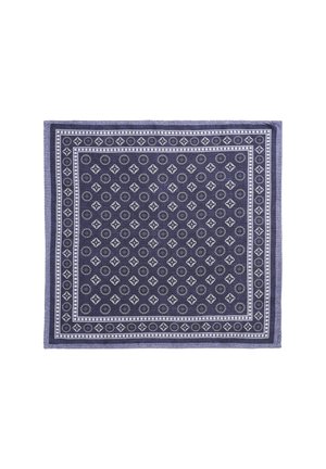 Navy patterned rug with a geometric design, featuring small white diamonds and circular motifs, bordered by a solid navy edge.