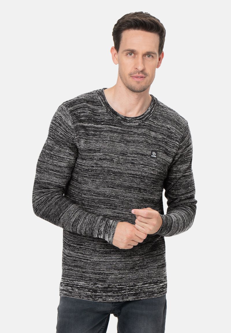 Suéter de manga larga a rayas negro y gris con cuello redondo, material de algodón, y un pequeño logo de la marca en el lado izquierdo del pecho.