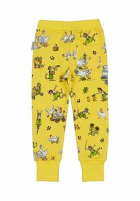Gula bomullsjoggers med lekfulla djurillustrationer och barn i olika aktiviteter, med en bakficka och smalnande muddar.