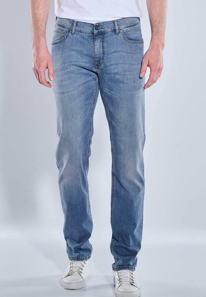 Light blue denim jeans with a straight cut, five pockets, and subtle fading. Features contrasting thread stitching and a button fly closure.