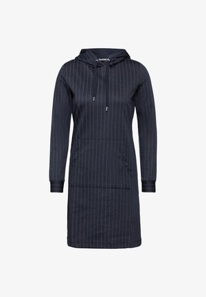 Kapitánský šaty v tmavě námořnické barvě s bílými vertikálními pruhy. Obsahuje dlouhé rukávy, přední kapsu a žebrované manžety pro zvýšení textury.