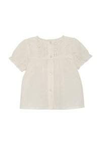 Witte katoenen blouse met korte pofmouwen, geborduurde details bij de halslijn en een knoopsluiting aan de voorkant. Zachte textuur en een losse pasvorm.