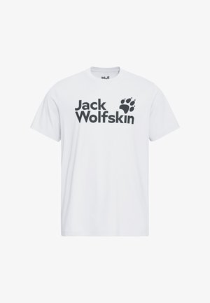 Wit T-shirt met korte mouwen en zwarte "Jack Wolfskin" tekst en pootafdruk logo gecentreerd op de voorkant.